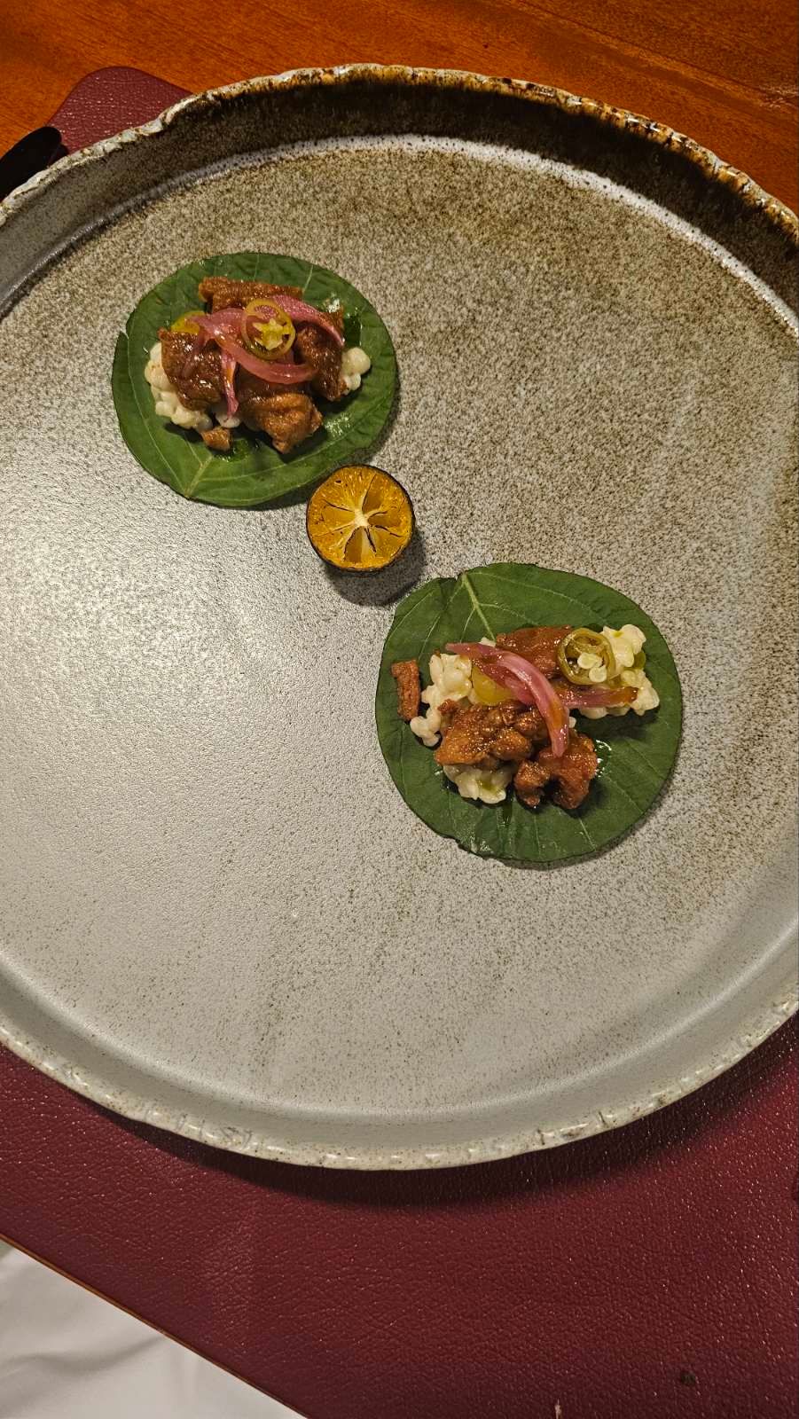Mollejas sweetbread with adlai pickled onion and burnt calamansi